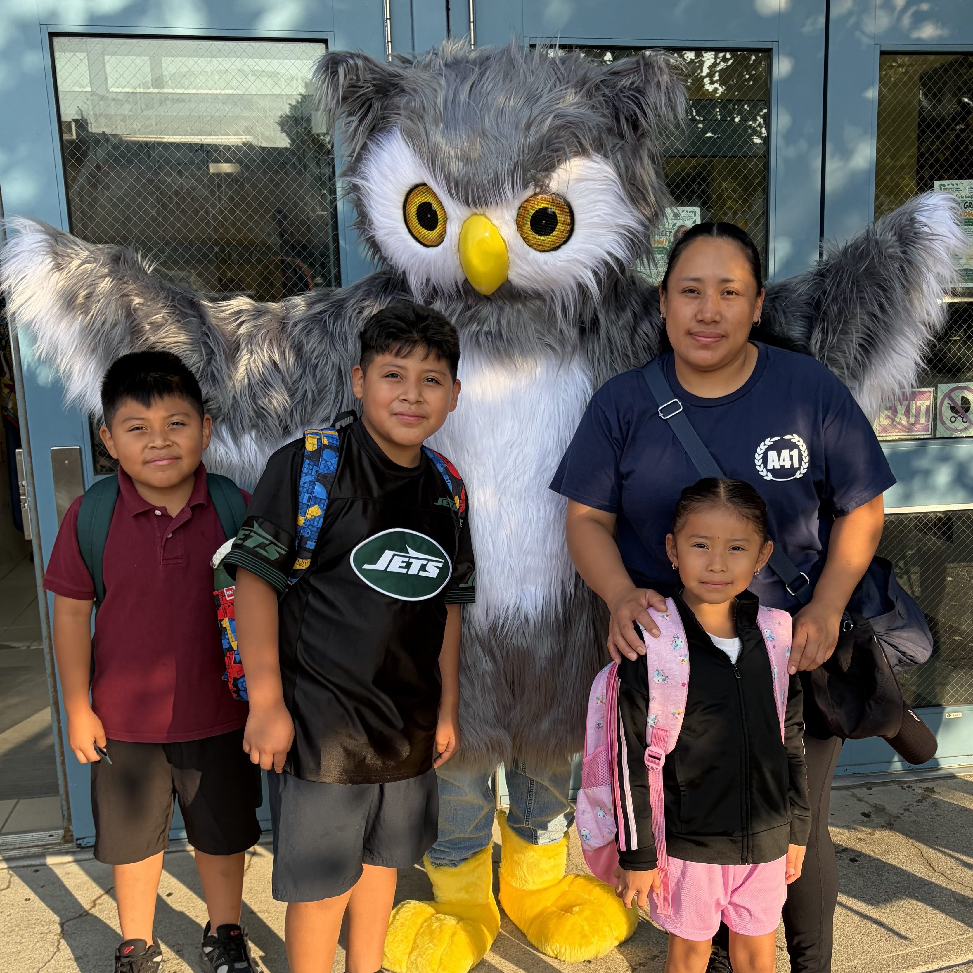 a family and the owl
